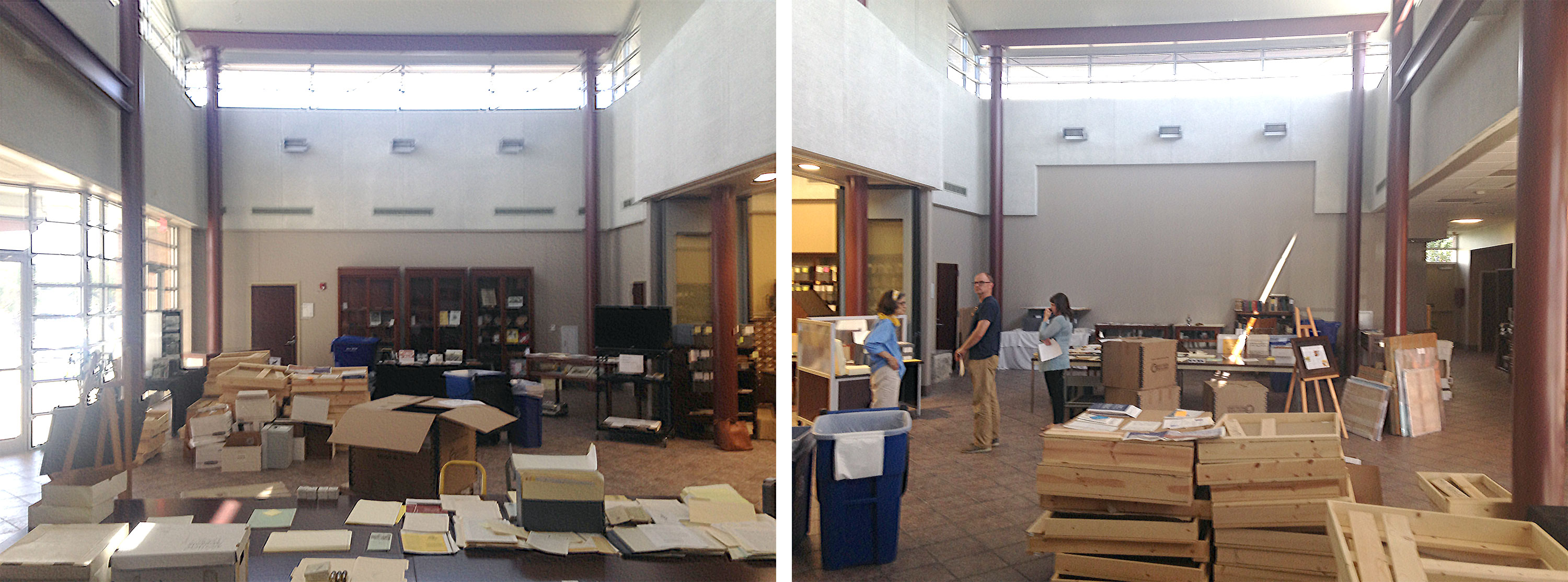 Lobby space filled with crates, tables, open boxes and other junk